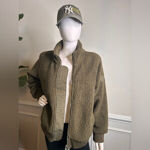 Calvin Klein Women’s fuzzy green jacket. Large, front pockets, full zip.